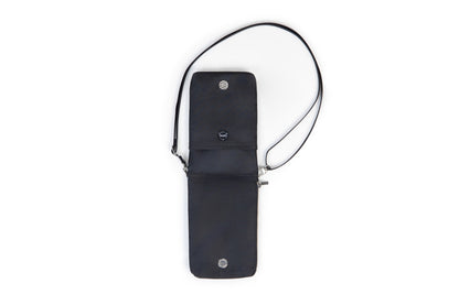 Black Dash crossbody bag with a strap on a white background